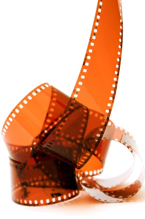 Overexposed old camera film strip over a white backgroundの写真素材