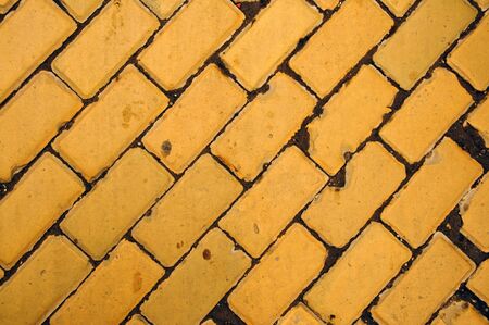 Yellow bricks pavement, background texture