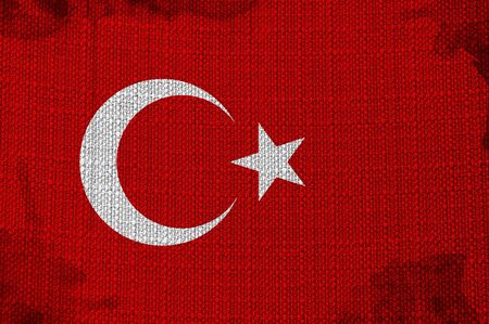 Flag of Turkey overlaying a detailed fabric textureの写真素材