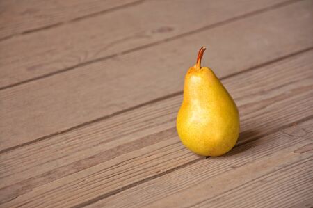 Tasty yellow pear on table; agriculture background image - organic food productionの写真素材
