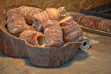 Trdlo or trdelnik - traditional national Czech sweet pastry dough, cooked on an open fire.の写真素材
