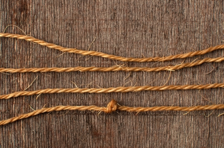 Rope  string and weathered wood backgroundの写真素材