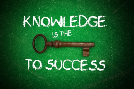 Knowledge is the key to success written on a green chalkboardの写真素材