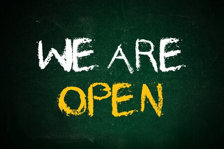 We are closed, message written on the green chalkboardの写真素材