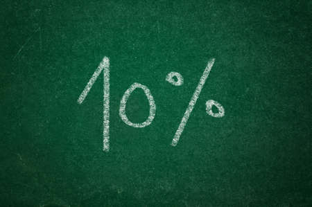 ten percent written on grungy green chalkboard textureの写真素材