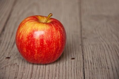 Tasty red apples on table; agriculture background image - organic food productionの写真素材