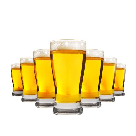 Glasses of cold, fresh beer over a white background. Lager in glasses.の写真素材
