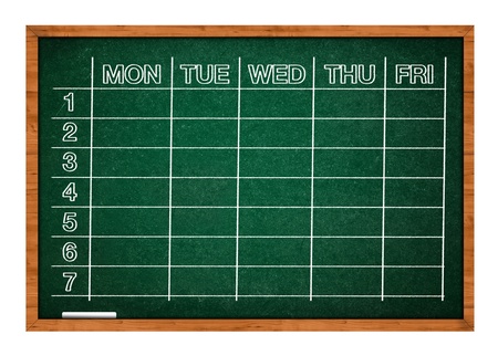 School timetable handwritten on a green classroom chalkboardの写真素材