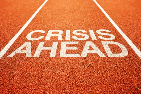 Crisis ahead warning on athletics all weather running trackの写真素材