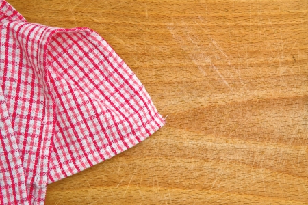 Table kitchen napkin on wooden background.の写真素材