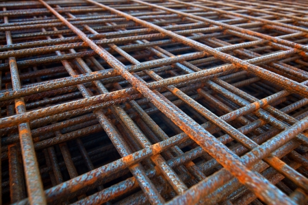 reinforcing mesh, steel bars stacked for constructionの写真素材