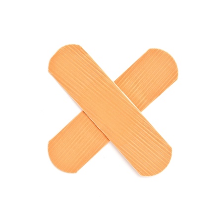 First aid adhesiveplaster over white background, medical equipment.の写真素材