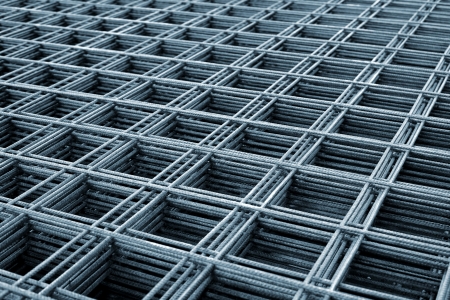 Reinforcing steel mesh, close up image of construction material.