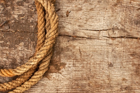 Ship rope and weathered wood backgroundの写真素材