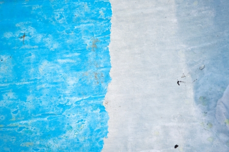 Grunge textured paper background with old torn postersの写真素材