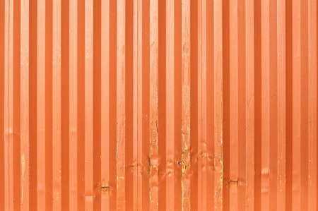 Train cargo containers. Orange metal transport container texture.の写真素材