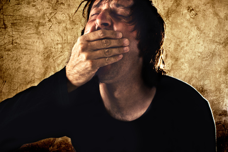 Man with severe tooth ache, grunge editing.