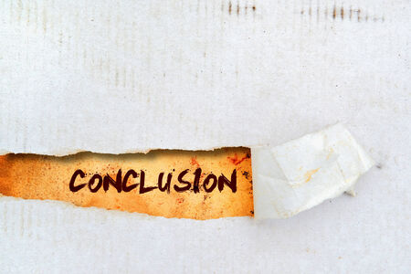 Conclusion title on old grunge torn paperの写真素材