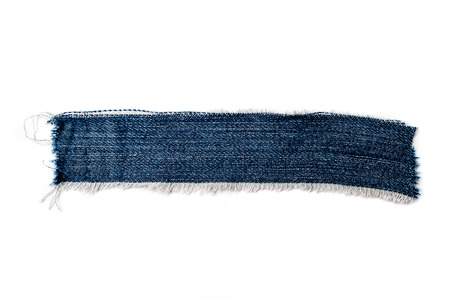Torn blue jeans texture as copy space, denim texture