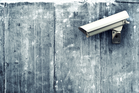 CCTV camera. Security camera on the wall. Private property protection.