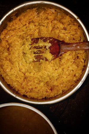 Fried cabbage in metal frying panの写真素材