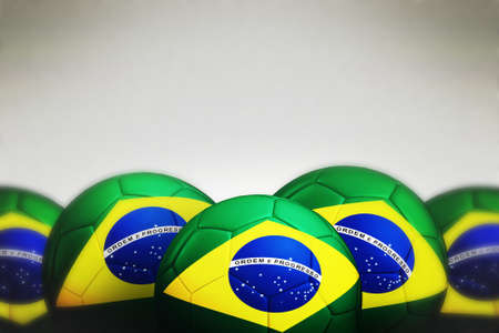 Soccer ball with Brazil flag on gray background, 3d render の写真素材
