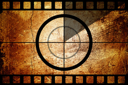 Vintage movie film strip with countdown border over grunge backgroundの写真素材