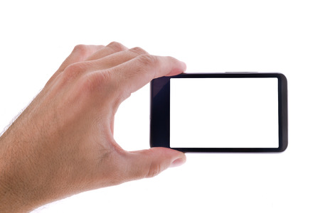 Male hand holding generic mobile smart phone with blank white screen isolated on white backgroundの写真素材