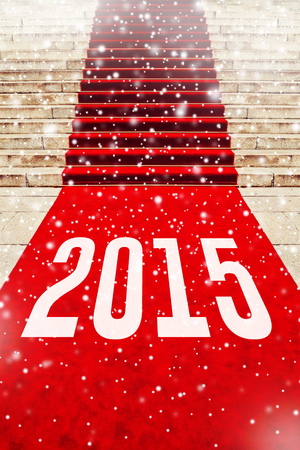 Red carpet with number 2015 on staircase marking the route taken by vips and celebrities on ceremonial events. Happy New Year.の写真素材