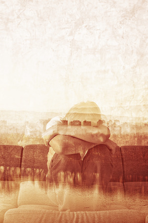 Social Alienation Concept, Depressed Man covering face and crying in despair.の写真素材