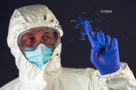 Genetic engineering and science, scientist wearing protective clothing working in laboratoryの写真素材