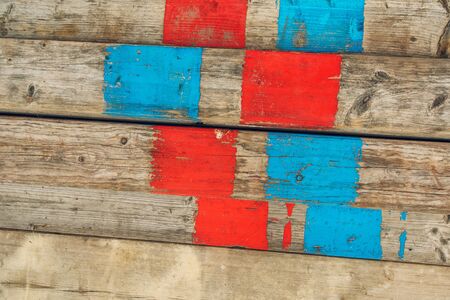 Old scaffolding planks on construction site, wooden backgroundの写真素材