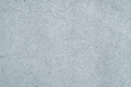 Light gray concrete wall surface background, close up of urban pattern textureの写真素材