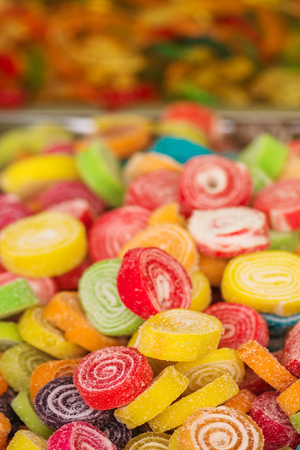 Sweets on street market, colorful candy treats in outdoor shop, selective focusの写真素材