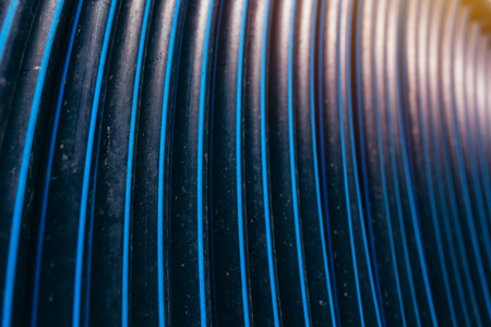 Agricultural irrigation spool hose as abstract background, selective focusの写真素材