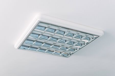 Ceiling neon tube lights in bright room interiorの写真素材