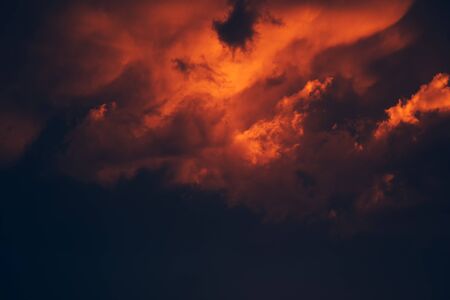 Dramatic stormy sky, dark clouds before rain. Weather, climate and meteorology background.の写真素材
