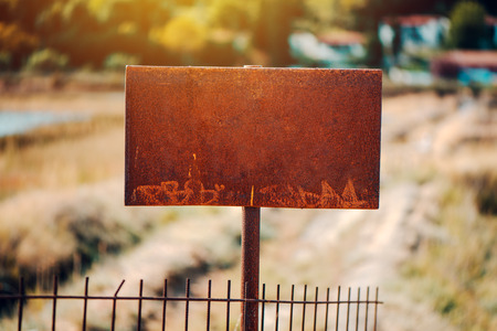 Corroded rusty sign board as copy spaceの写真素材