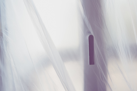 Plastic sheet masking over the door, home improvement and decorationの写真素材