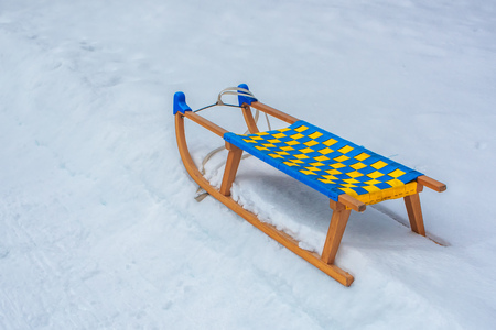 Wooden sledge in winter snow, selective focusの写真素材