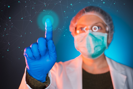 Healthcare worker using modern innovative technology in medicine, female doctor working on virtual screenの写真素材