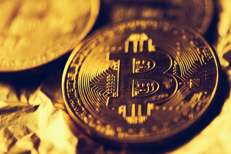 Bitcoin Cryptocurrency, golden coin close up with selective focusの写真素材
