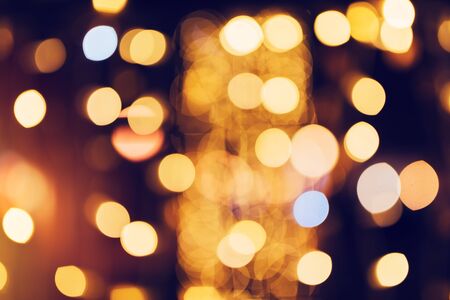 Christmas and New year street light decoration bokeh as abstract holiday season backgroundの写真素材