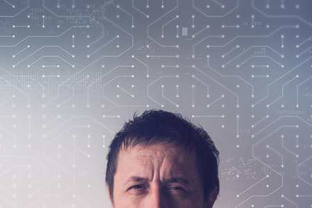 Artificial neural network concept with male head and computer circuit board