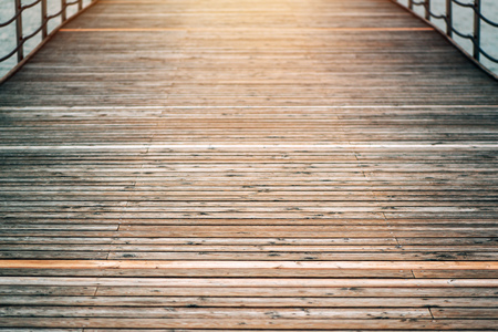 Wooden pier bridge as background with selective focusの写真素材