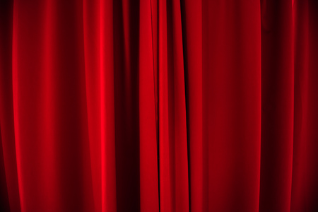 Red velvet curtains as abstract background or textureの写真素材