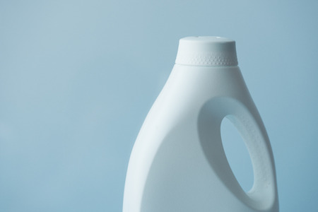 White plastic bottle container for liquid detergent or other chemical hygiene product with clean blank surface as copy spaceの写真素材
