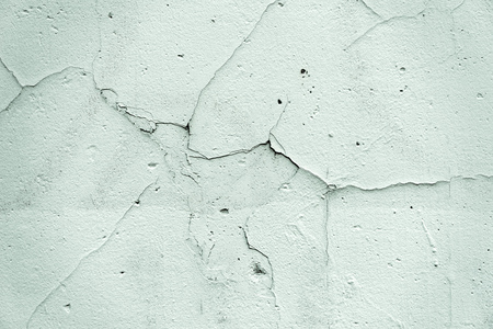 Cracked facade wall surface as texture or background