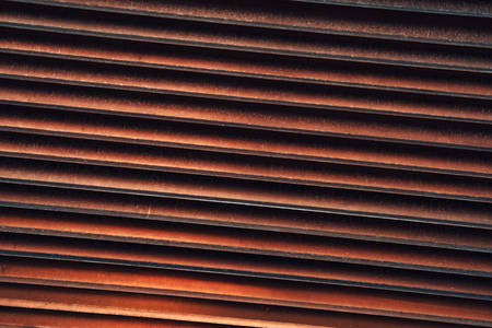 Rusty metal shutters as background and urban industrial texture