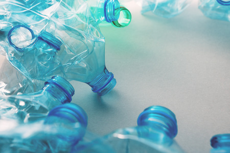 Crushed plastic bottles heap ready for recycling